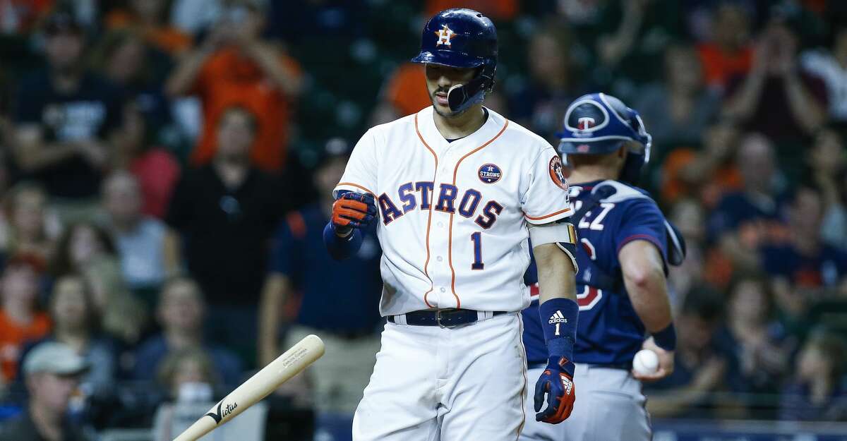 Carlos Correa of the Minnesota Twins reacts after striking out