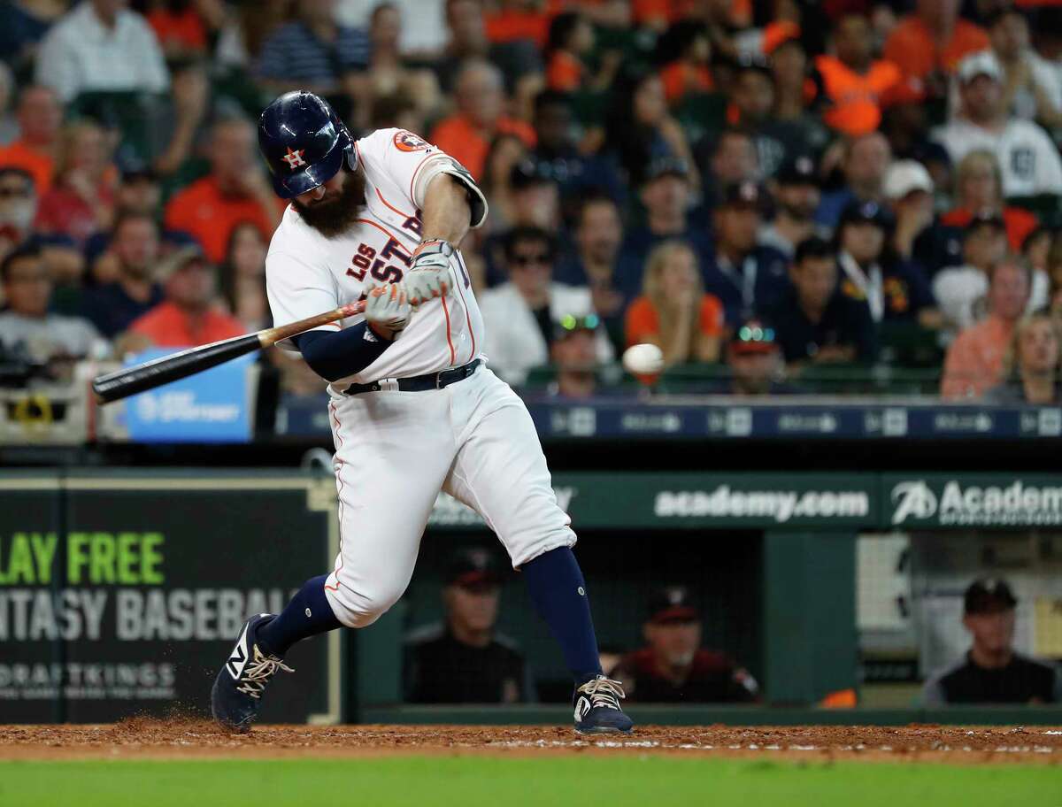 Houston Astros Tyler White (13) hits a ground-rule double during the sixth inning of an MLB game at Minute Maid Park, Sunday, September 16, 2018, in Houston.
