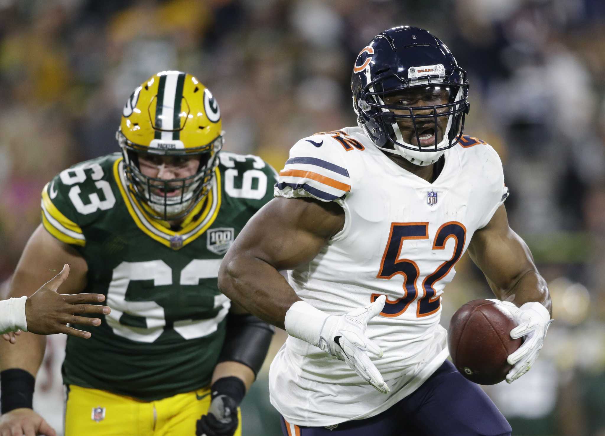 Chicago Bears' Roy Robertson-Harris sacks Green Bay Packers' Aaron Rodgers  during the first hal …