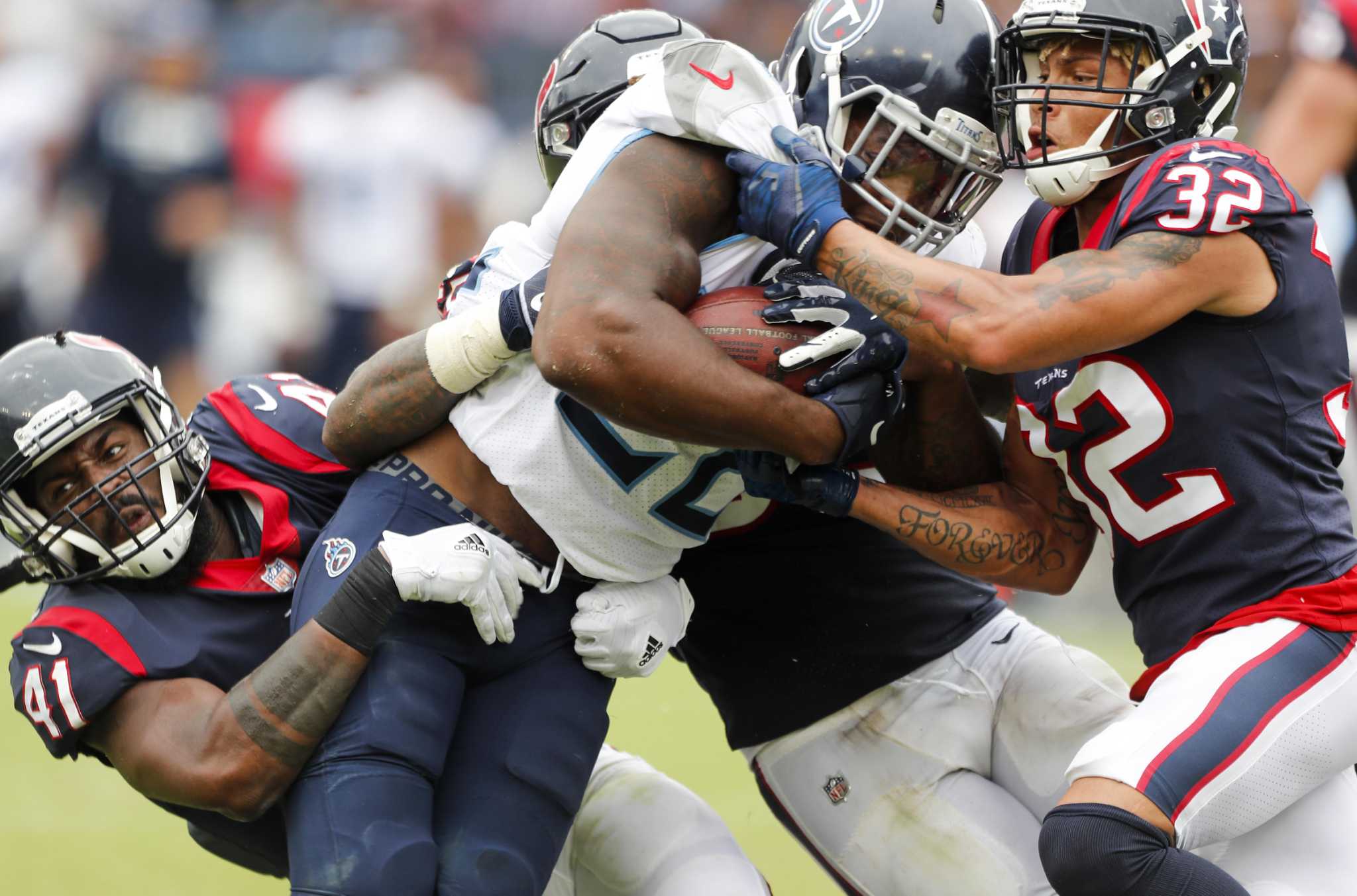 Houston Texans linebackers Jadeveon Clowney, left, and Whitney