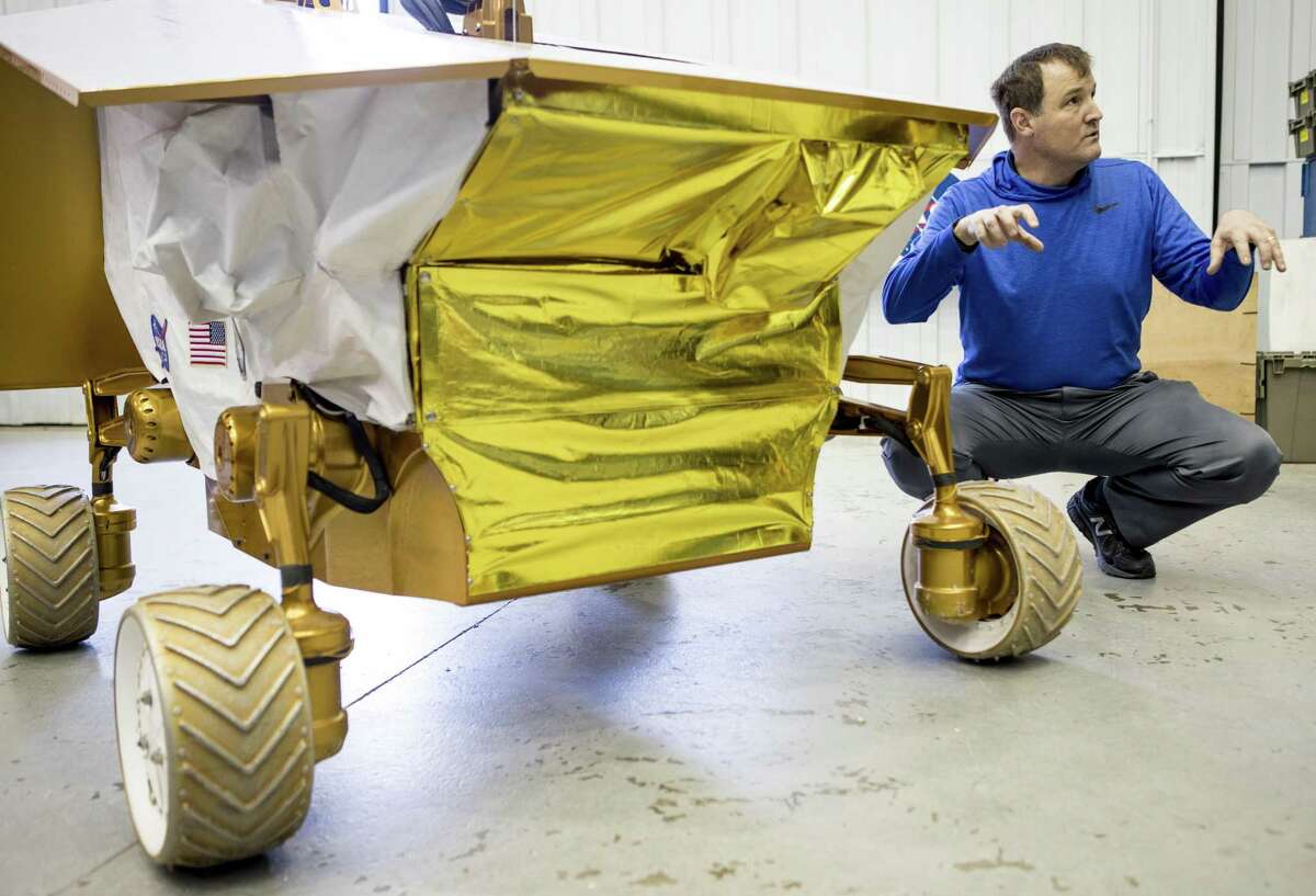 Bill Bluethmann, a robotics enginer at Johnson Space Center, talks about at the Resource Prospector 2015 Rover Prototype at the space center in this November 2017 file photo.