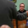 Council member Donald Russell, center, listens to Mayor Shawn Morse speak as an emergency meeting of Cohoes Common Council was called to address fresh charges against at Cohoes City Hall on Monday, Sept. 17, 2018 in Cohoes, N.Y. Earlier Morse said he doesn't plan on stepping down from his job. (Lori Van Buren/Times Union)