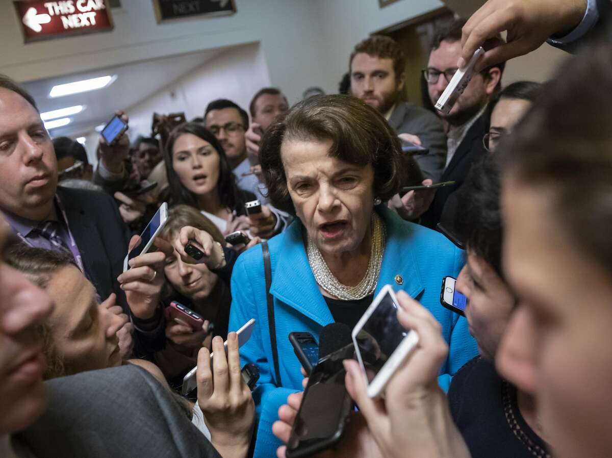 Sen. Dianne Feinstein, D-Calif., the ranking member on the Senate Judiciary Committee, responds to reporters' questions on Supreme Court nominee Brett Kavanaugh amid scrutiny of a woman's claim he sexually assaulted her at a party when they were in high school, on Capitol Hill in Washington, Tuesday, Sept. 18, 2018. (AP Photo/J. Scott Applewhite)