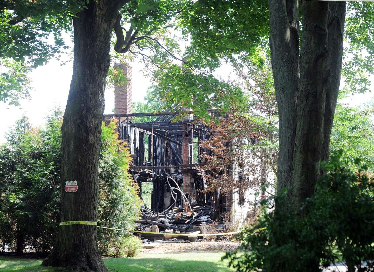 The aftermath of a house fire that occurred Friday, August 10, at 15 Locust Road in Greenwich, Conn., as seen Wednesday, August 15, 2018.