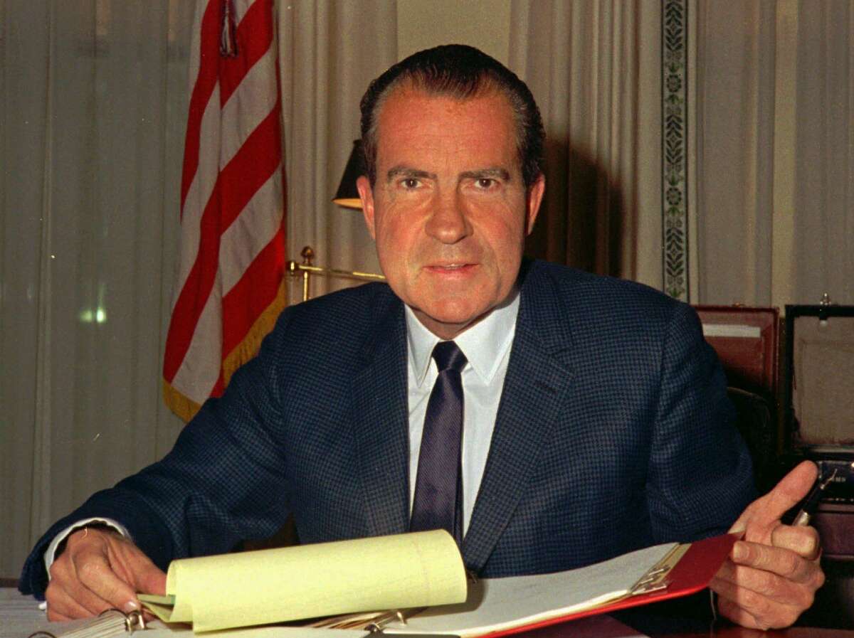 President Richard M. Nixon at his desk in the White House in 1969.