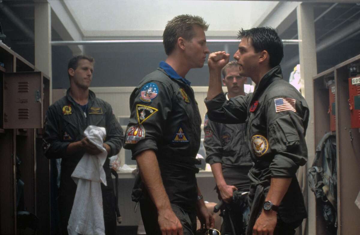 American actors Val Kilmer and Tom Cruise on the set of Top Gun, directed by Tony Scott. (Photo by Paramount Pictures/Sunset Boulevard/Corbis via Getty Images)