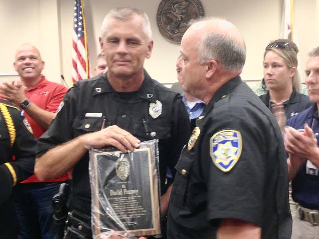 Alton officer honored after serving 20 years on police force, retires