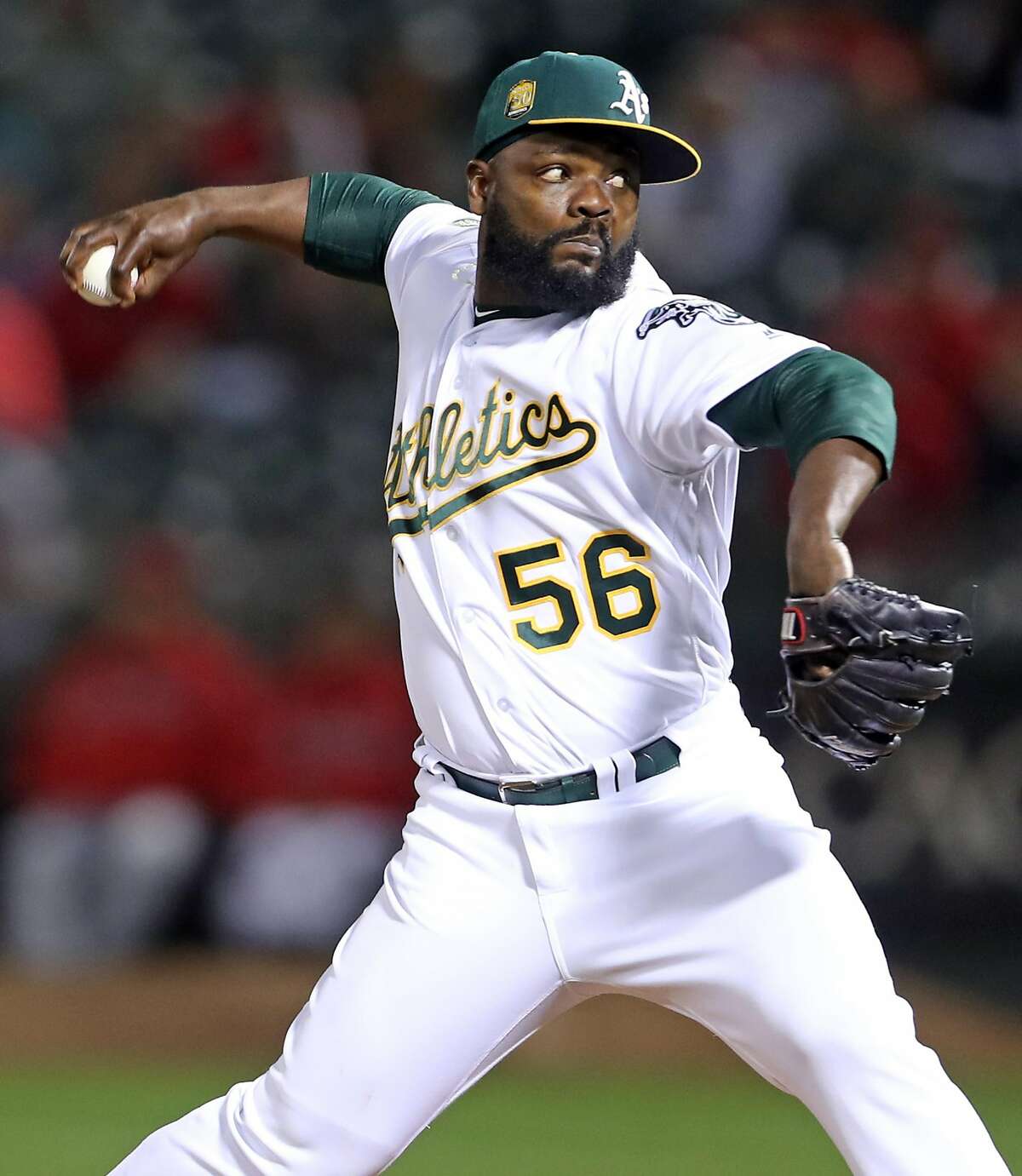 Oakland Athletics' Fernando Rodney pitches in 9th inning of Los Angeles Angels' 9-7 win in MLB game at Oakland Coliseum in Oakland, Calif. on Tuesday, September 18, 2018.