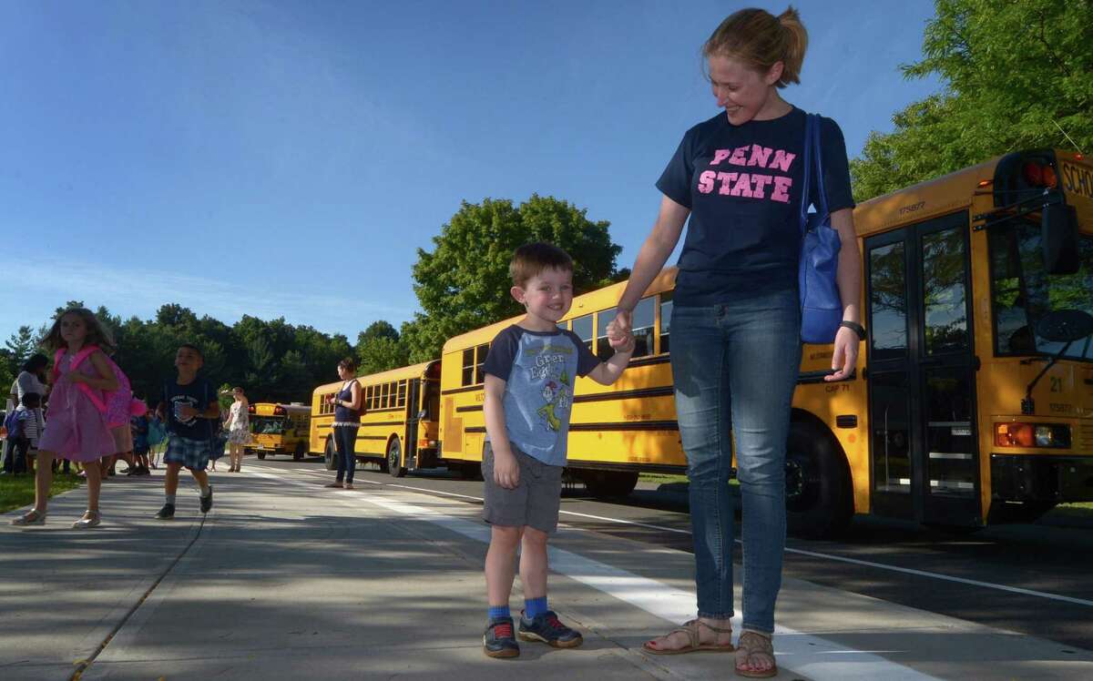 Sarah Fasano and her preschool son James Fasano arrive at Miller Driscoll to the first day of school, Sept. 4. Wilton Public Schools has partnered with the Wilton Youth Council to offer parents a six-week workshop called “How to Talk So Kids Will Listen and Listen So Kids Will Talk.”