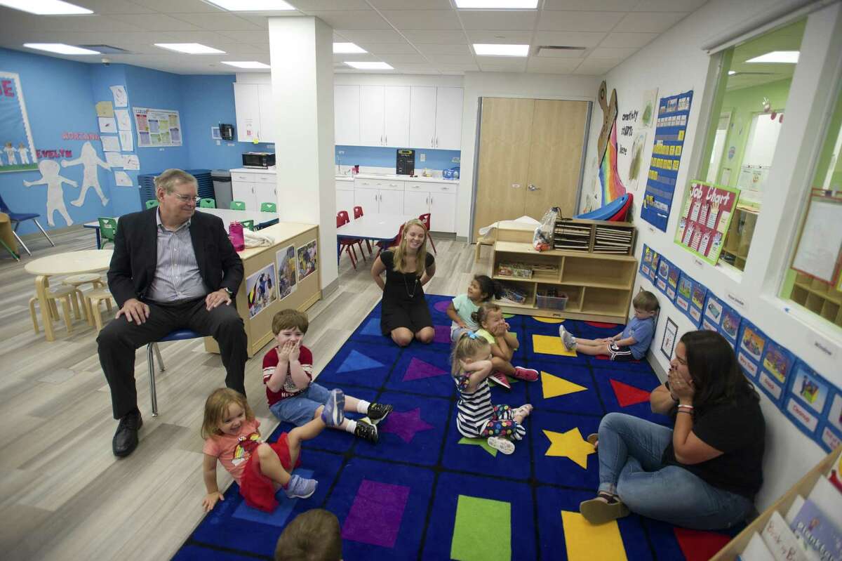 Preschoolers smile and laugh while singing a song for Stamford mayor David Martin inside the Education Station, a full-day year-round early childhood education center for infants to preschoolers, at the Italian Center on Newfield Ave. in Stamford, Conn. on Wednesday, Sept. 19, 2018.