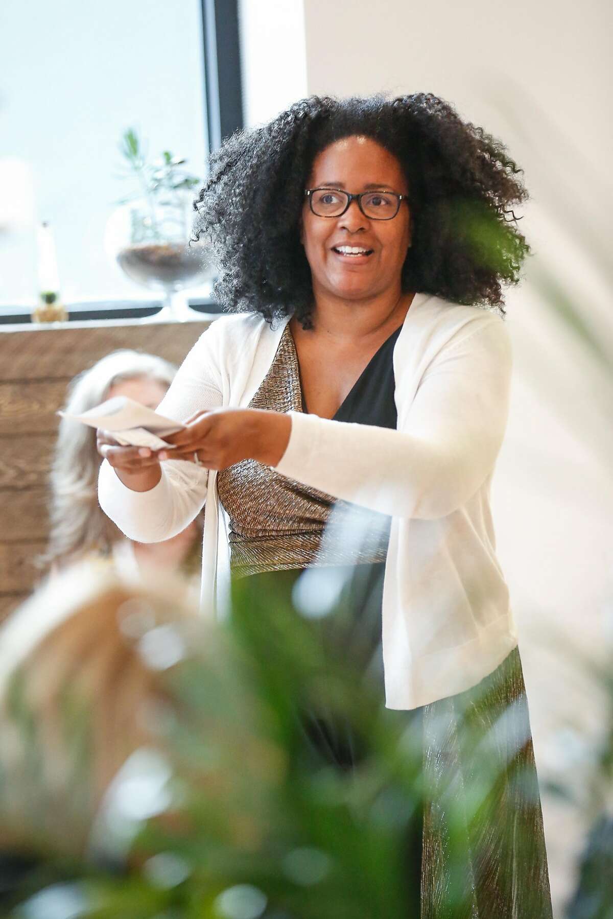 Ren� Jones, cofounder of Triple Apex, talks about her product to a group of women on Wednesday, July 25, 2018 in San Francisco, California. Ellementa organizes gatherings for women to share stories and experiences with cannabis and CBD and learn from experts in the field and discover new products.