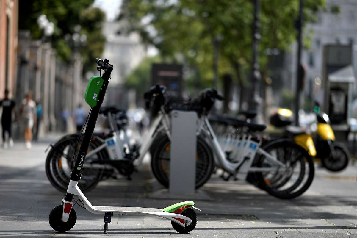 A picture shows an electric scooter of the Lime-S electric scooter-sharing service in Madrid on September 5, 2018. (Photo by GABRIEL BOUYS / AFP)GABRIEL BOUYS/AFP/Getty Images