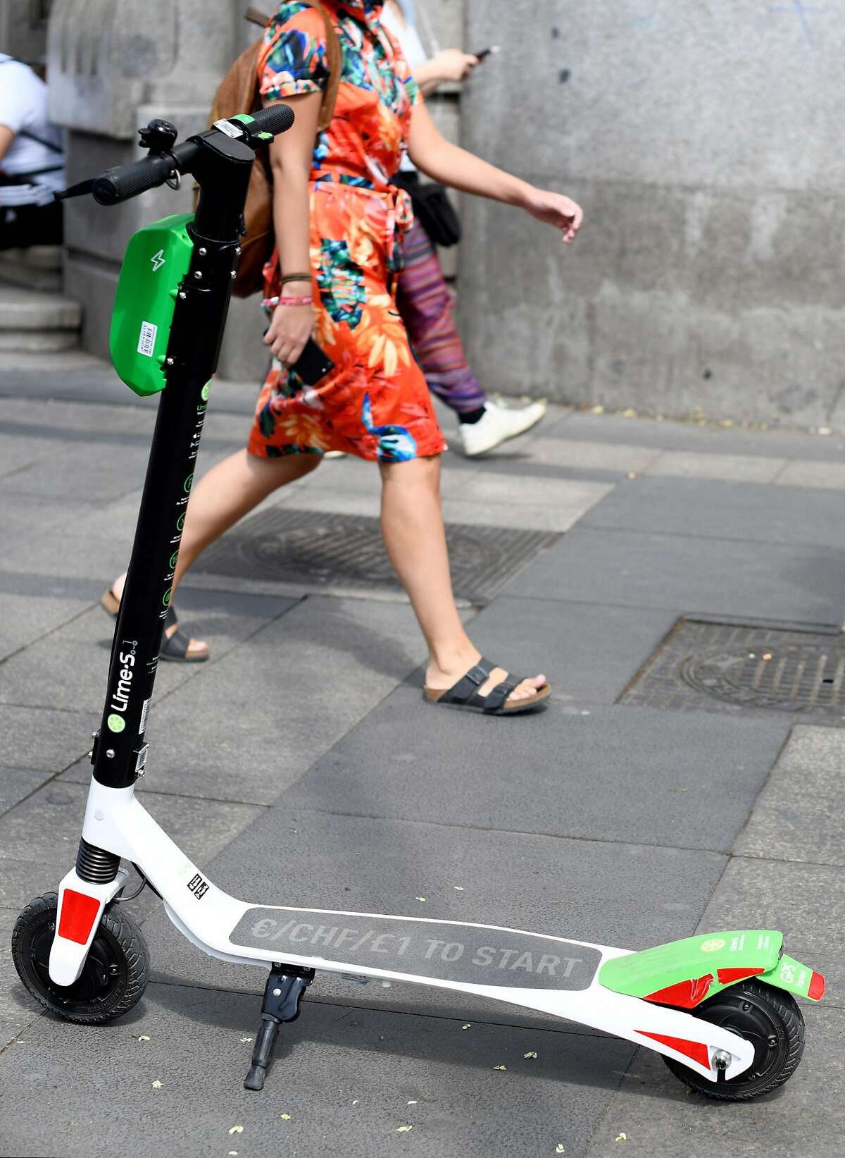 A picture shows an electric scooter of the Lime-S electric scooter-sharing service in Madrid on September 5, 2018. (Photo by GABRIEL BOUYS / AFP)GABRIEL BOUYS/AFP/Getty Images