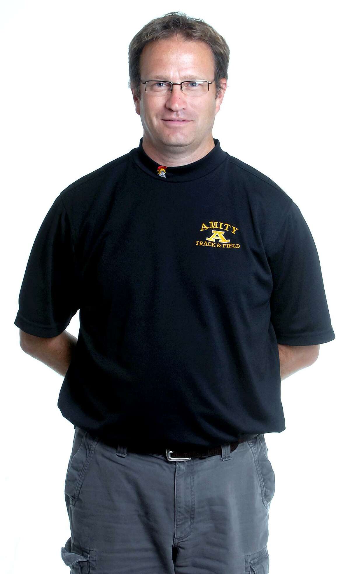 Thom Jacobs will be inducted to the Amity High School Hall of Fame on Oct. 18. Jacobs coached boys indoor and outdoor track for the Spartans.