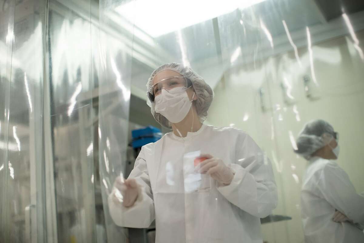 Marisa Victor leaves the formulations lab at 10x Genomics, which makes and sells technology to research labs and pharma companies that develop drugs on Thursday, Sept. 13, 2018, in Pleasanton, Calif.