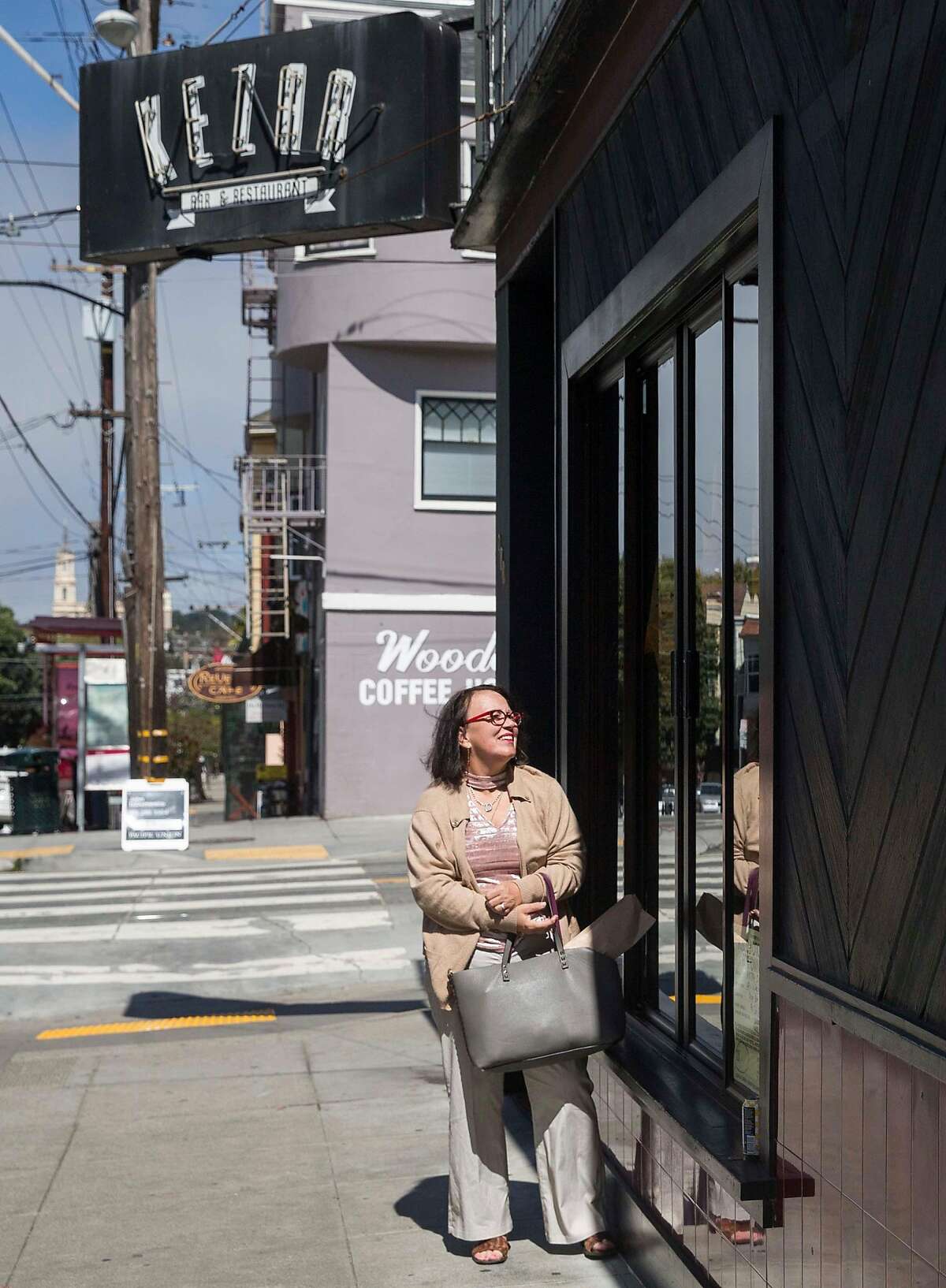Cole Valley resident Deanna Hodgin recounts her first encounter with Max, a man who has been known to harass women and girls in the Cole Valley neighborhood of San Francisco, Calif., while standing outside of Kezar Bar and Restaurant Tuesday, Sept. 18, 2018.