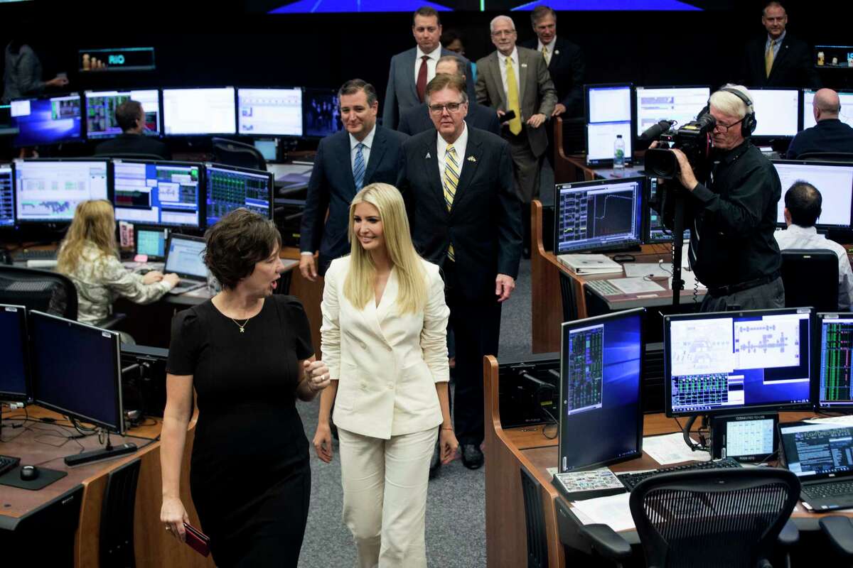 NASA Chief Flight Director Holly Ridings, leads Ivanka Trump, senior adviser to the president, into the International Space Station flight control room during a visit to the Johnson Space Center on Thursday, Sept. 20, 2018, in Houston.