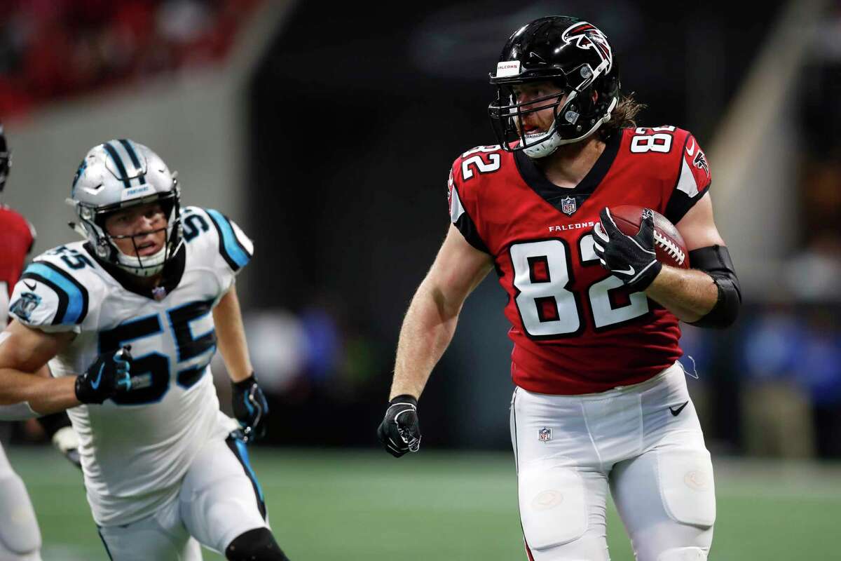 Atlanta Falcons tight end Logan Paulsen (82) runs with the ball after a catch against the Carolina Panthers during an NFL football game, Sunday, Sept. 16, 2018, in Atlanta. (Jeff Haynes/AP Images for Panini)