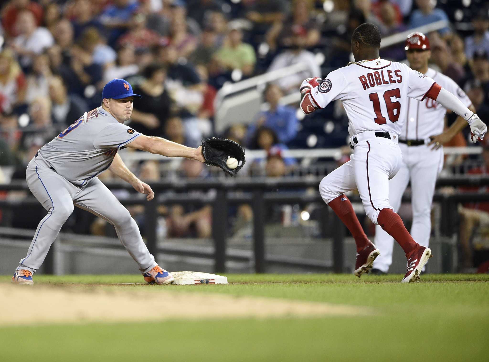 Sal Stewart of the Cincinnati Reds fields a fly ball during a