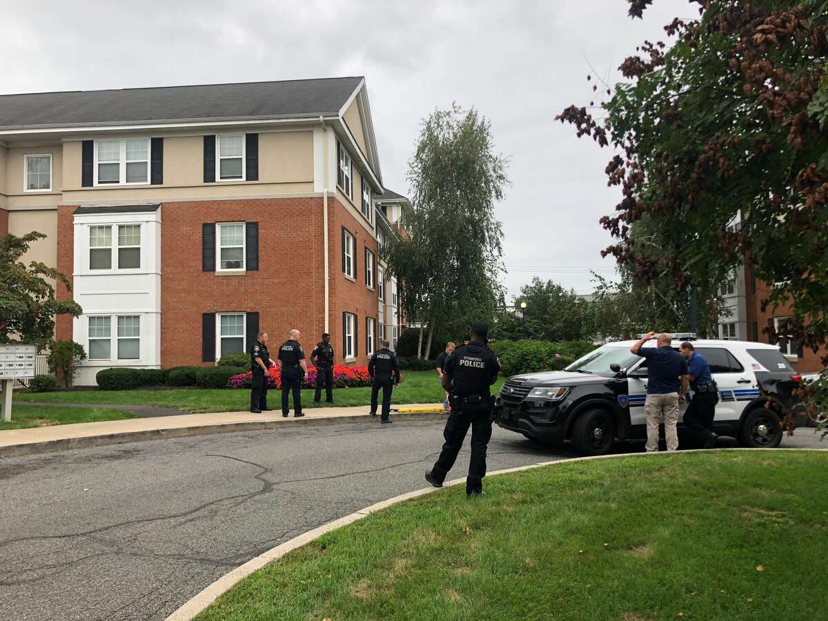 Police investigate a homicide at condo complex on Pequot Drive in Stamford on Friday, Sept. 21, 2018.
