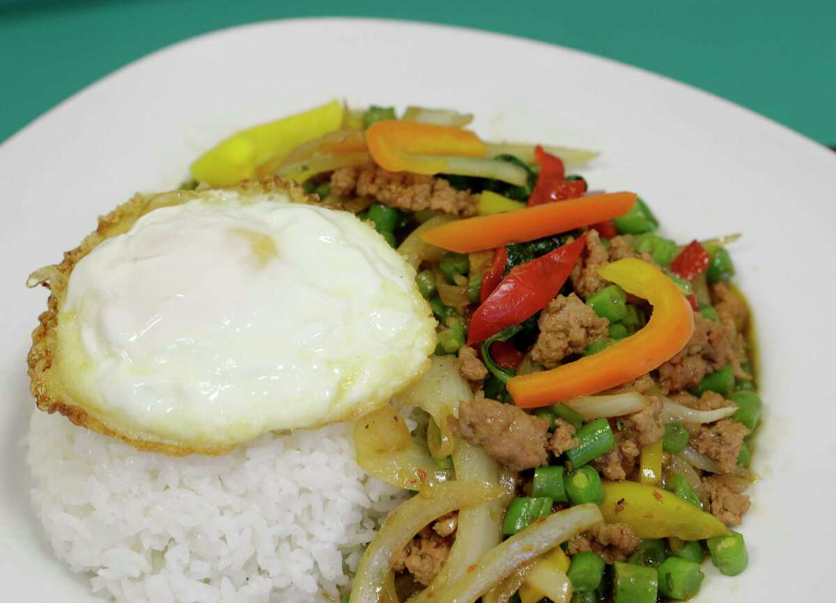 Pad kapao with a fried egg at Aim Thai