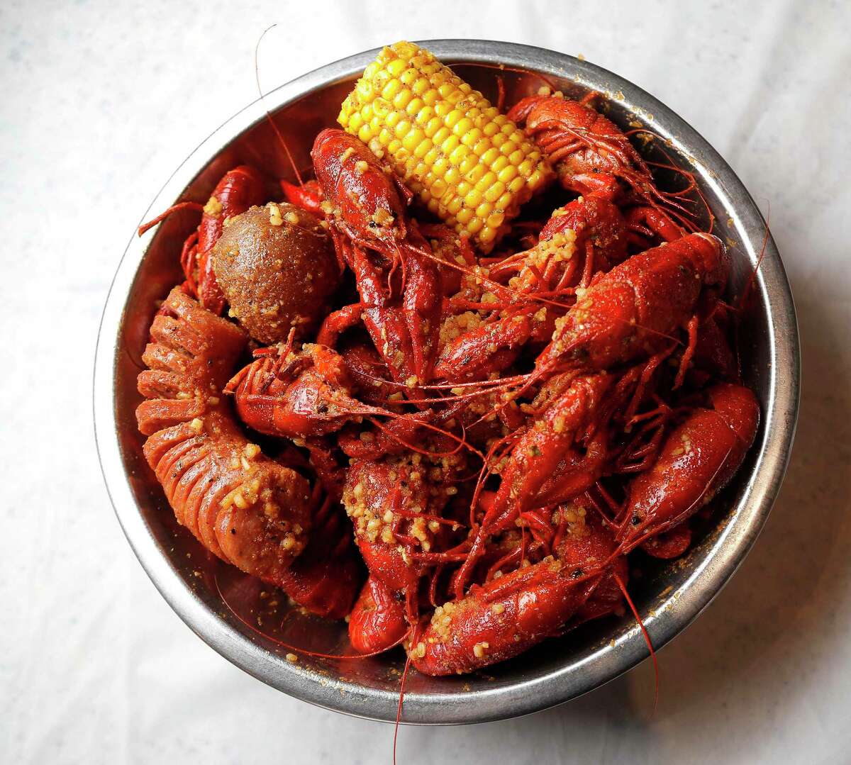 Ryan Pera: Agricole Hospitality  "Viet-Cajun crawfish. Like our city, this dish is a confluence of culture and backgrounds that work together harmoniously. And, it's simply delicious. My favorite spot is Crawfish and Noodles."