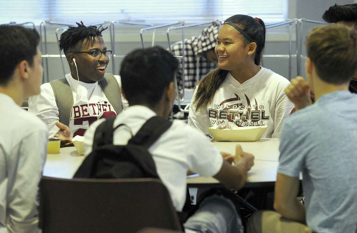 Amari McKinnon, left, and Sabrina Le, both 15, have breakfast before the start of school at Bethel High School, Friday, Sept. 21, 2018. Breakfast is offered at Bethel High School from 7:05 a.m. to 7:30 a.m. Friday 48 breakfasts were served. 11 at full price. 12 at a reduced price and 25 free.