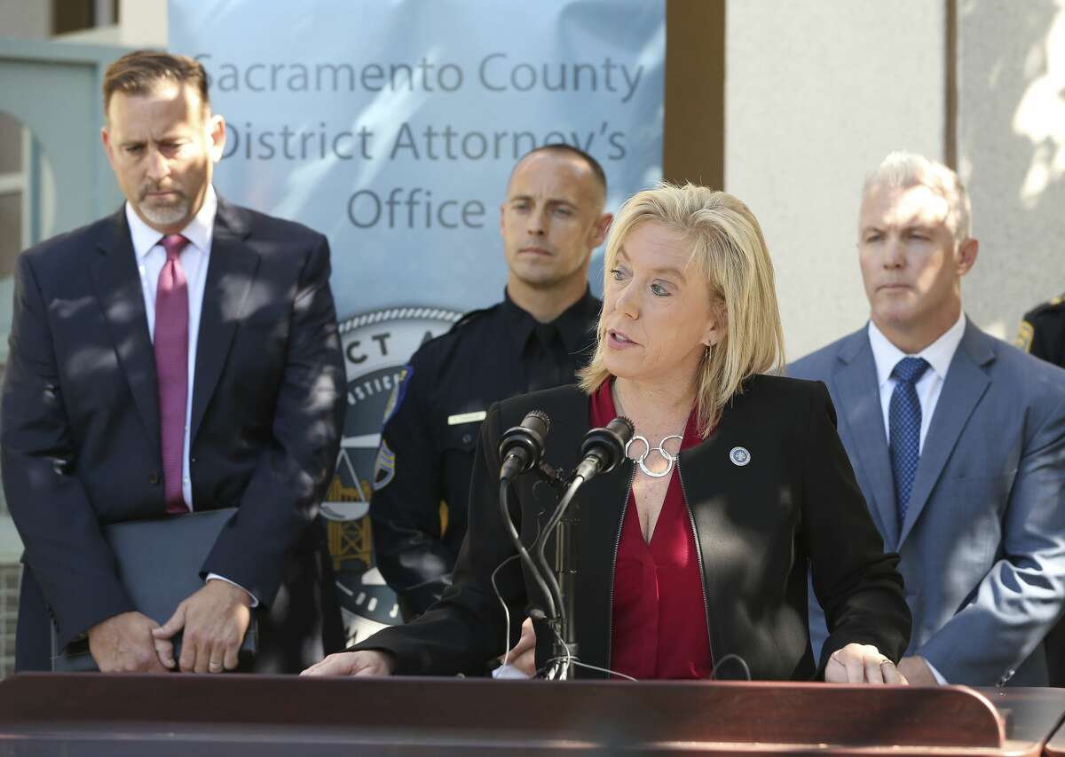 Sacramento County District Attorney Anne Marie Schubert, discusses the arrest of Roy Charles Waller, who is suspected of committing a series or rapes, during a news conference Friday, Sept. 21, 2018, in Sacramento, Calif. Waller, 58, was taken into custody in Berkeley by Sacramento Police, Wednesday Sept. 20, 2018, and faces multiple counts of rapes that occurred in Northern California starting in 1991. In the background are from left, is Brian Staebell, Sonoma County chief deputy district attorney, Sacramento Police Sgt. Vance Chandler and Jeff Reisig, Yolo County District Attorney, right, (AP Photo/Rich Pedroncelli)