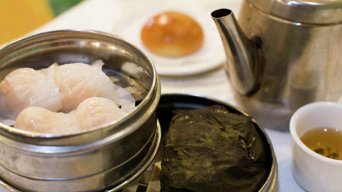 Steamed shrimp dumplings and lotus-leaf rice at Golden Dim Sum