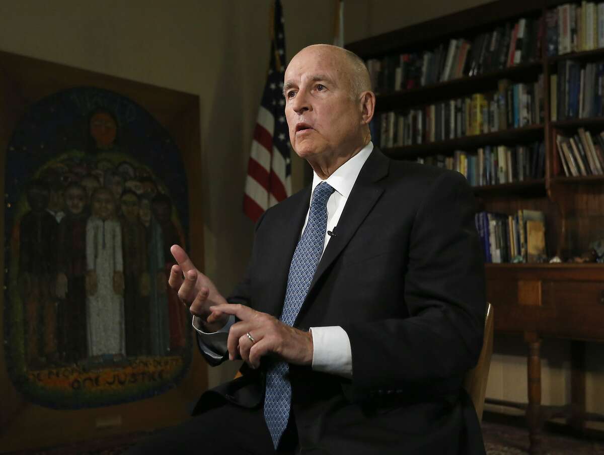 Gov. Jerry Brown discusses the goals of the global climate summit he is hosting in San Francisco and legislation he signed directing California to phase out fossil fuels for electricity by 2045 during an interview with The Associated Press, Monday, Sept. 10, 2018, in Sacramento, Calif. Brown's climate summit begins in Wednesday, Sept. 12. (AP Photo/Rich Pedroncelli)