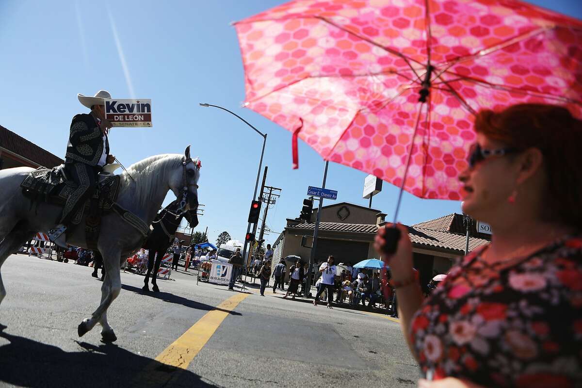 LOS ANGELES, CA - SEPTEMBER 16: A horseback rider carries a sign for U.S. Senate candidate Kevin de Leon during the 72nd annual East LA Mexican Independence Day Parade on September 16, 2018 in Los Angeles, California. 11.6 million immigrants from Mexico lived in the U.S. in 2016, making Mexico the top country of origin of U.S. immigrants, according to the Pew Research Center. (Photo by Mario Tama/Getty Images)