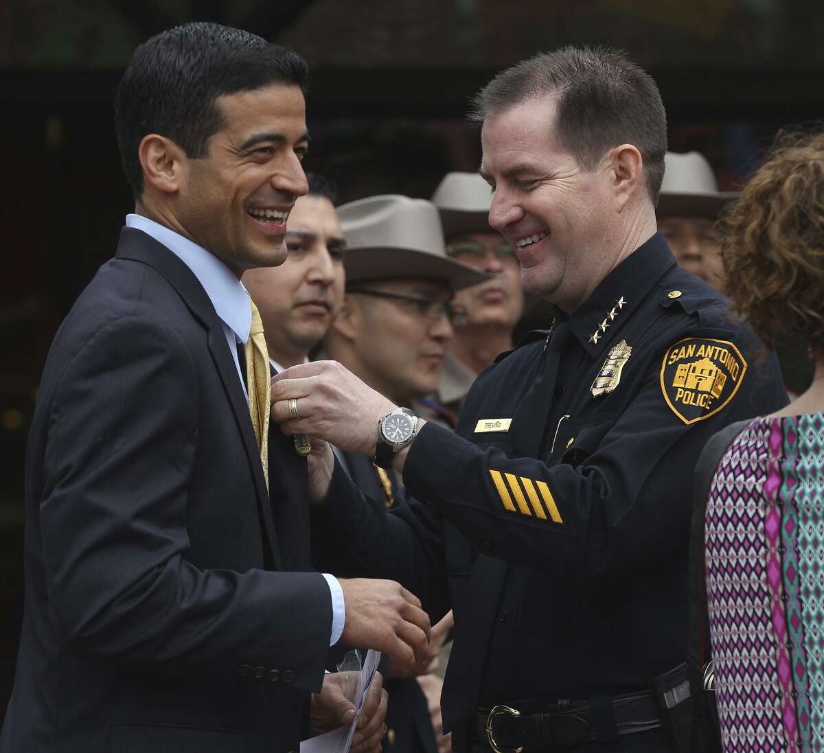 Bexar County District Attorney Nico LaHood (left) at a 2015 Fiesta ceremony with then-San Antonio Police Chief Anthony Treviño. In 2015, Treviño indefinitely suspended Officer Matthew Martin for allegedly altering evidence related to a drug arrest. LaHood’s office twice declined to bring criminal charges against Martin.