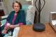 Estella Perkins talks to her Google Home, Friday, Sept. 21, 2018.