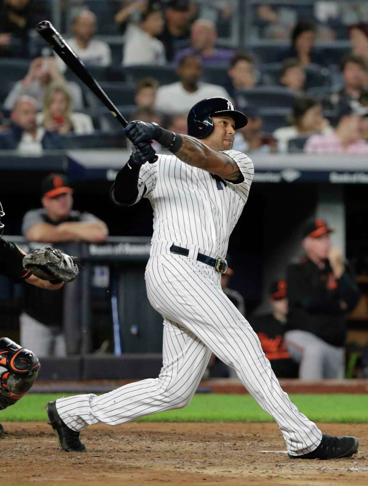 New York Yankees' Aaron Hicks follows through on a two-run home run during the fourth inning of a baseball game against the Baltimore Orioles Friday, Sept. 21, 2018, in New York. (AP Photo/Frank Franklin II)