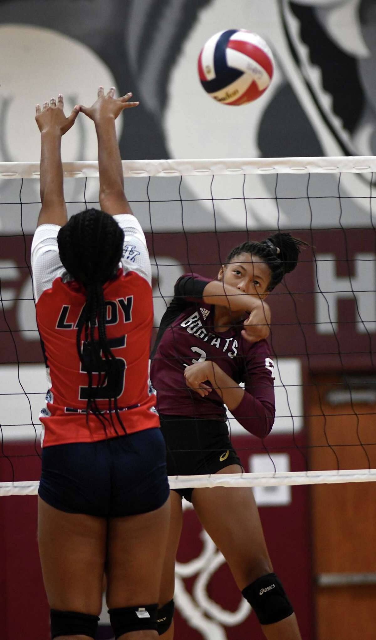 Cy-Fair outside hitter Lauryn Bourne works for a kill during a volleyball matchup.