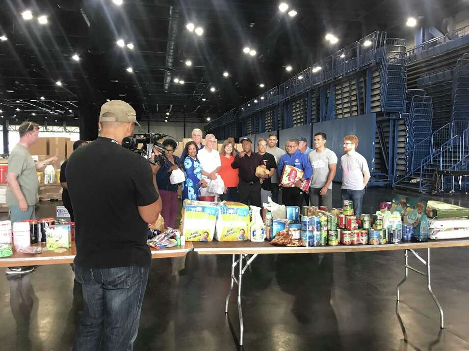 Mayor Sylvester Turner visited the George R. Brown Convention Center on Saturday afternoon, where volunteers were collecting donations to send to victims of Hurricane Florence. Photo: Emily Foxhall / Emily Foxhall / Houston Chronicle