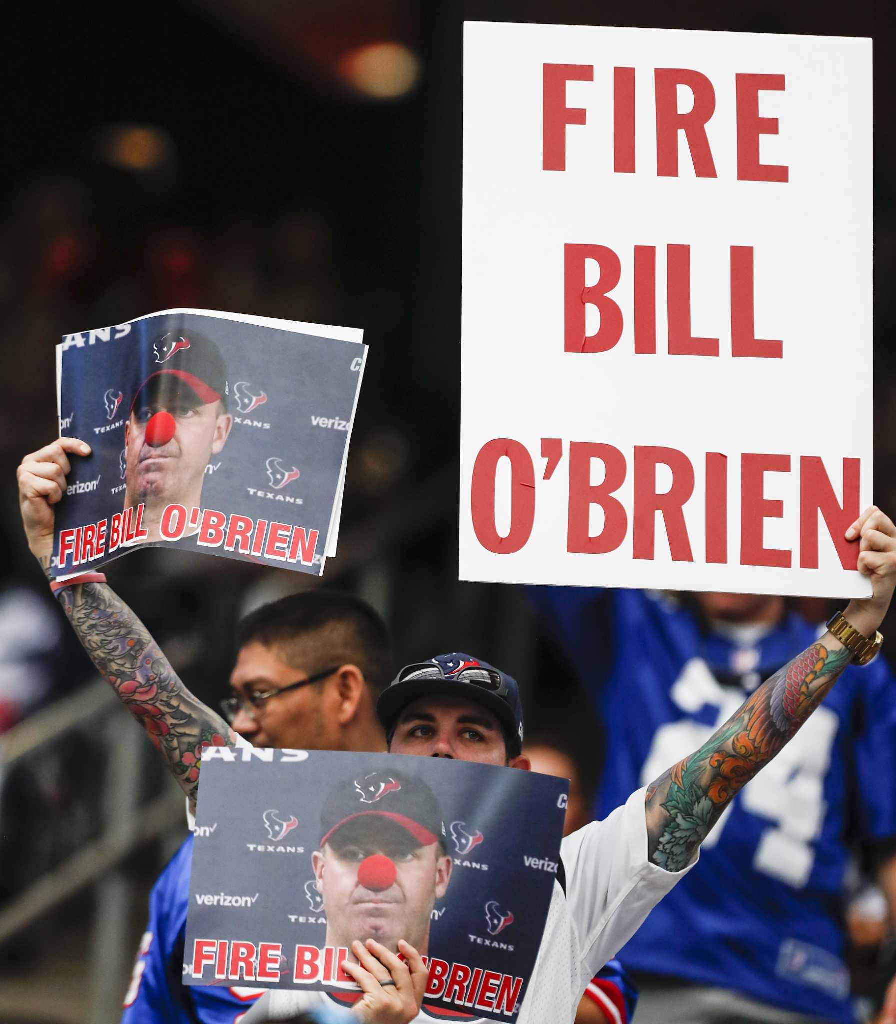 Fed-up Texans fan wears 'Sell the team' paper bag at game