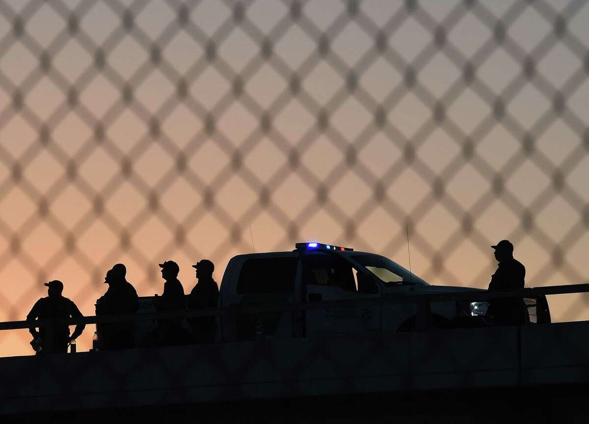 (FILES) In this file photo taken on February 17, 2016, US Border Patrol officers guard the border fence separating US and Mexico in the town of El Paso, Texas. - The US was to begin construction in Texas on September 22, 2018, of part of President Donald Trump's border wall designed to curb illegal immigration. Running along four miles (six kilometers) of the 2,000-mile (3,219-km) border with Mexico, the new section will replace existing fencing along the boundary between El Paso, Texas, and Ciudad Juarez, Mexico, US Customs and Border Protection said in a statement. (Photo by Mark Ralston / AFP)MARK RALSTON/AFP/Getty Images