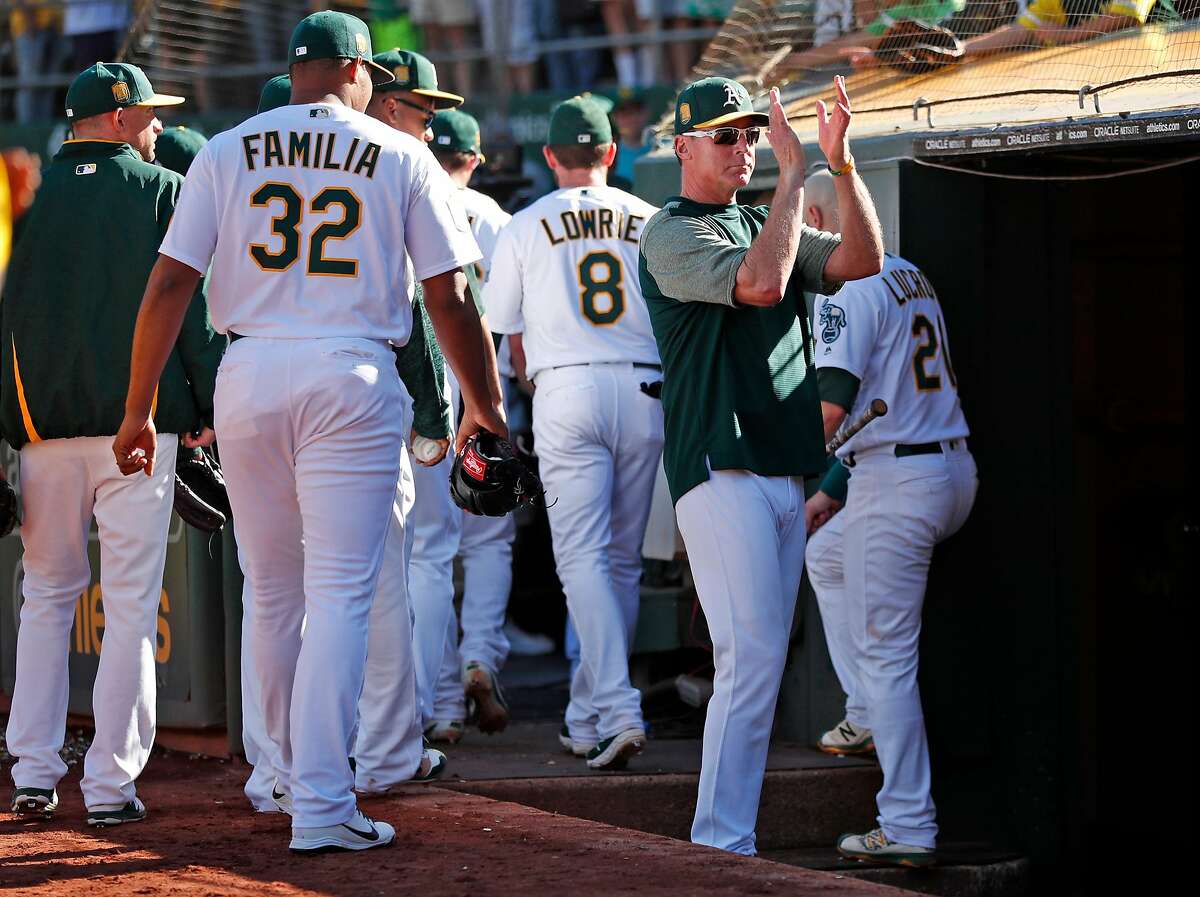 Oakland Athletics' manager Bob Melvin applauds the fans after final regular season home game of the season, a 5-1 loss to the Minnesota Twins, at Oakland Coliseum in Oakland, Calif. on Sunday, September 23, 2018.