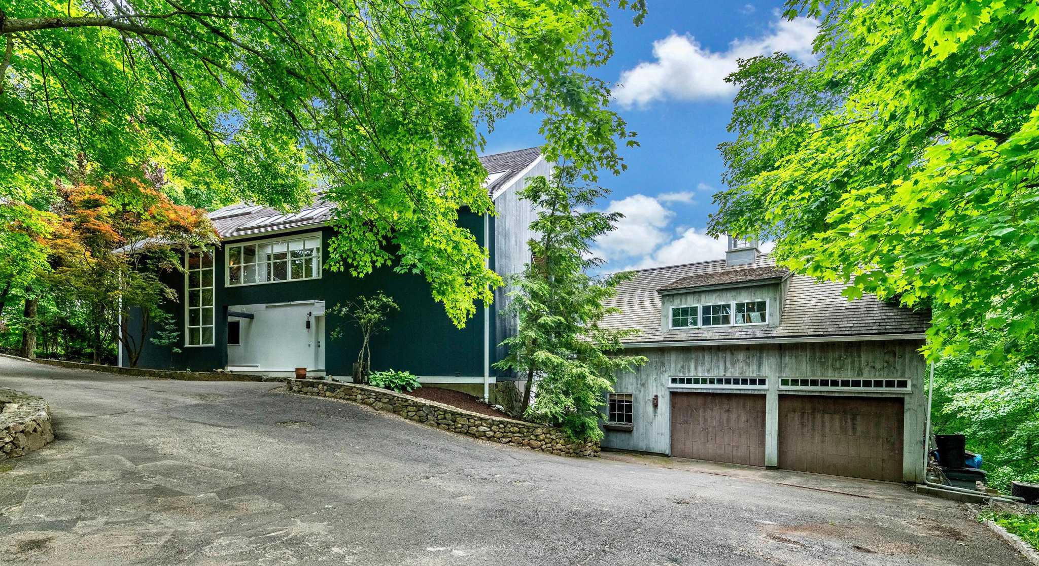 on the market a modern four bedroom home is inserted into the framework of a reconstructed old barn connecticut post a modern four bedroom home is inserted