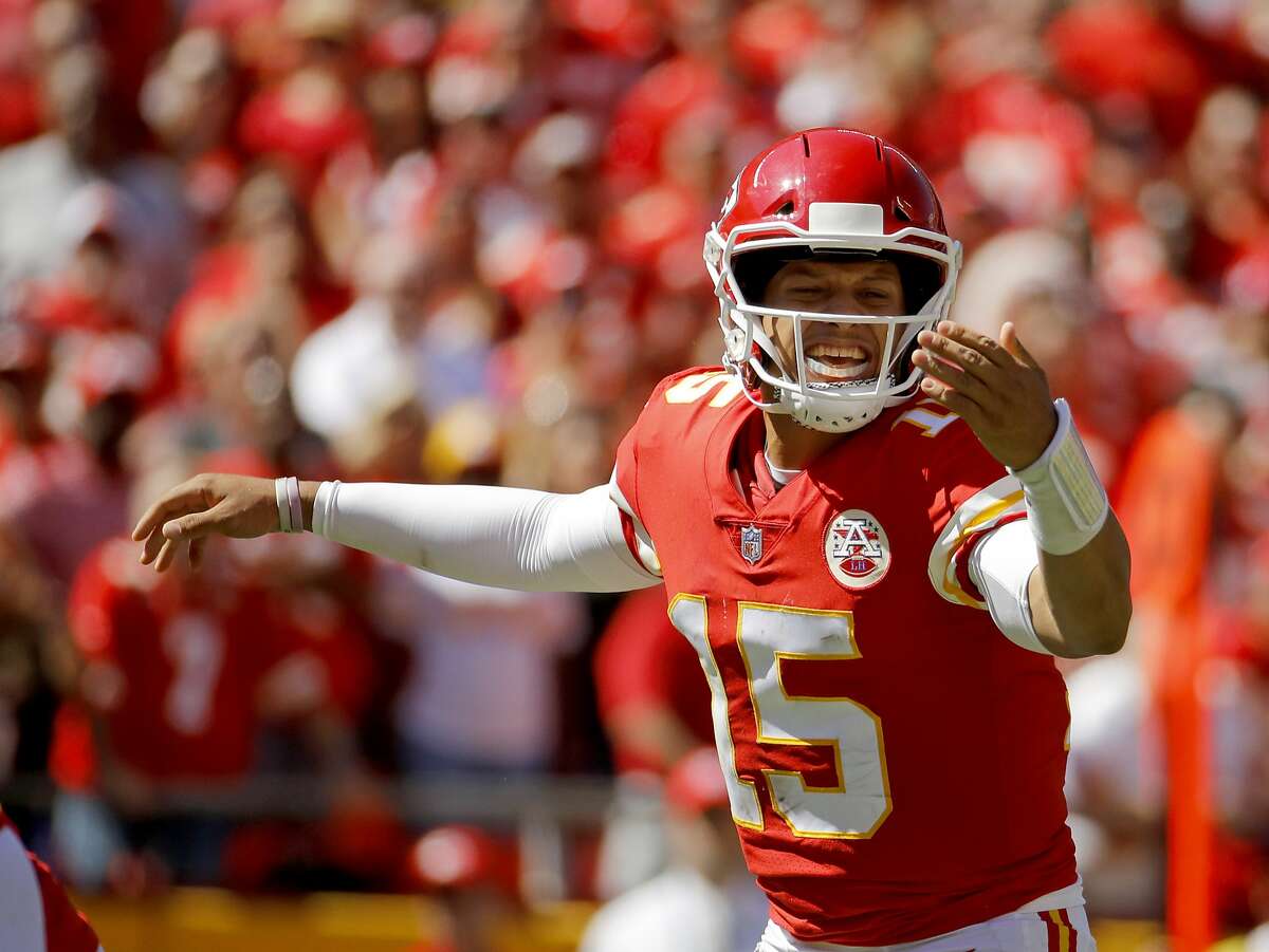 Kansas City Chiefs quarterback Patrick Mahomes (15) calls a play during the first half of an NFL football game against the San Francisco 49ers in Kansas City, Mo., Sunday, Sept. 23, 2018. (AP Photo/Charlie Riedel)