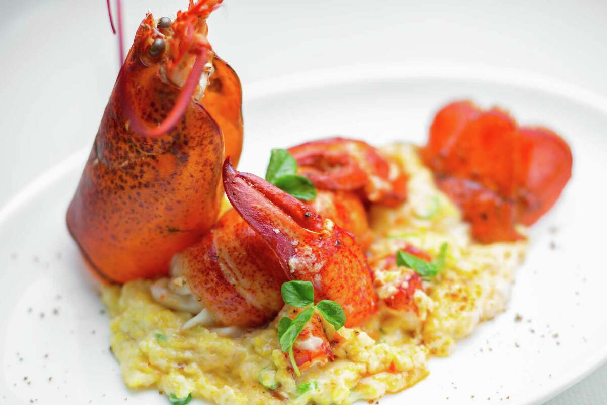 BBQ Maine lobster tail with butter poached claws and smoked gouda Anson Mills grits at Killen's STQ
