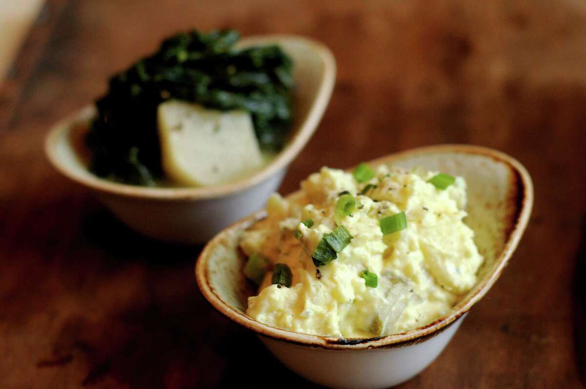 Potato salad and buttered collard greens & turnips at Pappas Delta Blues Smokehouse
