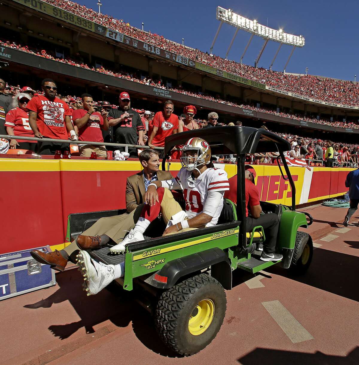 San Francisco 49ers quarterback Jimmy Garoppolo (10) is carted off the field after being injured during the second half of an NFL football game against the Kansas City Chiefs, Sunday, Sept. 23, 2018, in Kansas City, Mo. (AP Photo/Charlie Riedel)