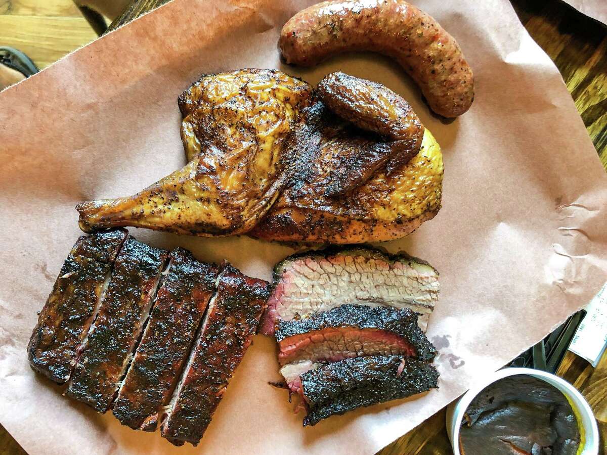 Smoked half-chicken and other goodies at Tejas Chocolate & Barbecue
