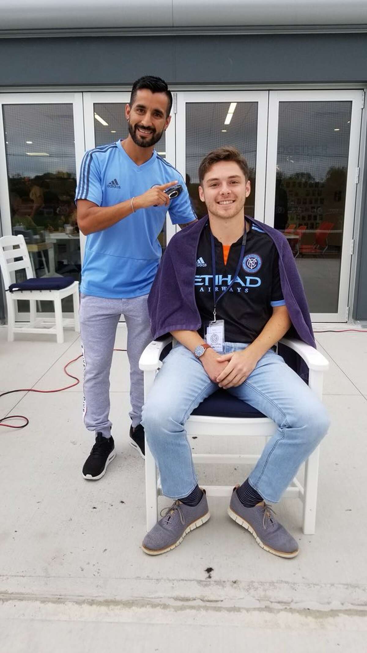 New York City F.C. midfielder Maxi Moralez poses with fan Matt DePrima.