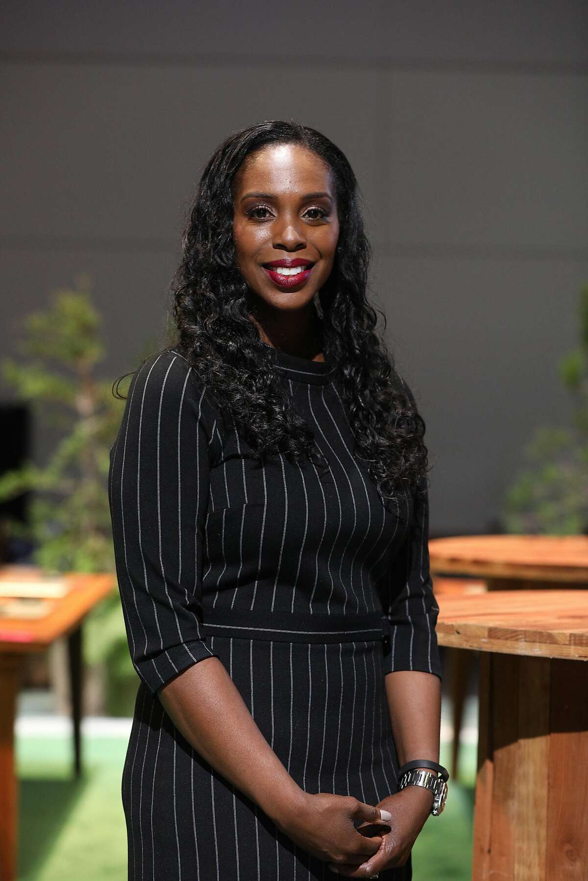 Ebony Frelix, Salesforce.org chief philanthropy officer, stands for a portrait at Dreamforce 2018 on Monday, September 24, 2018 in San Francisco, Calif.