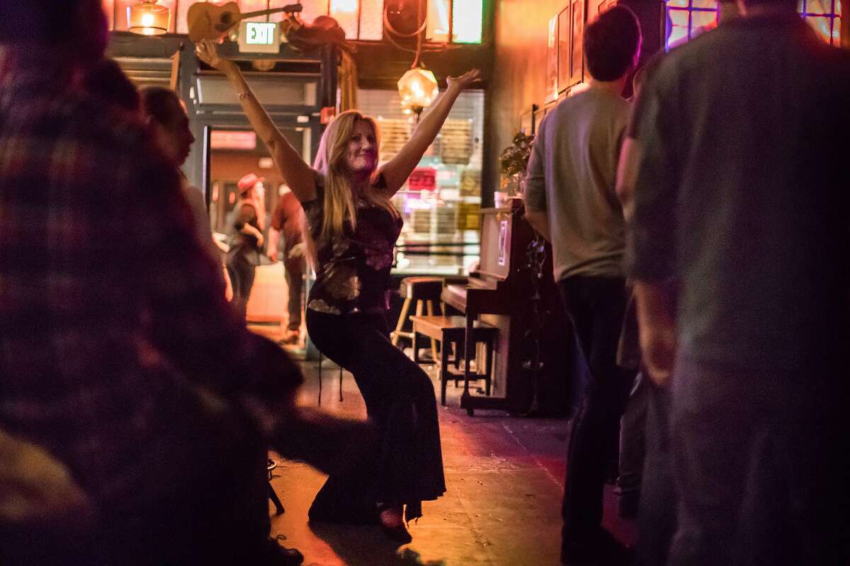 Rachel Cepeda dances to the music of the Ghost-Note band at Ivy Room on Saturday, Sept. 22, 2018, in Albany, Calif.