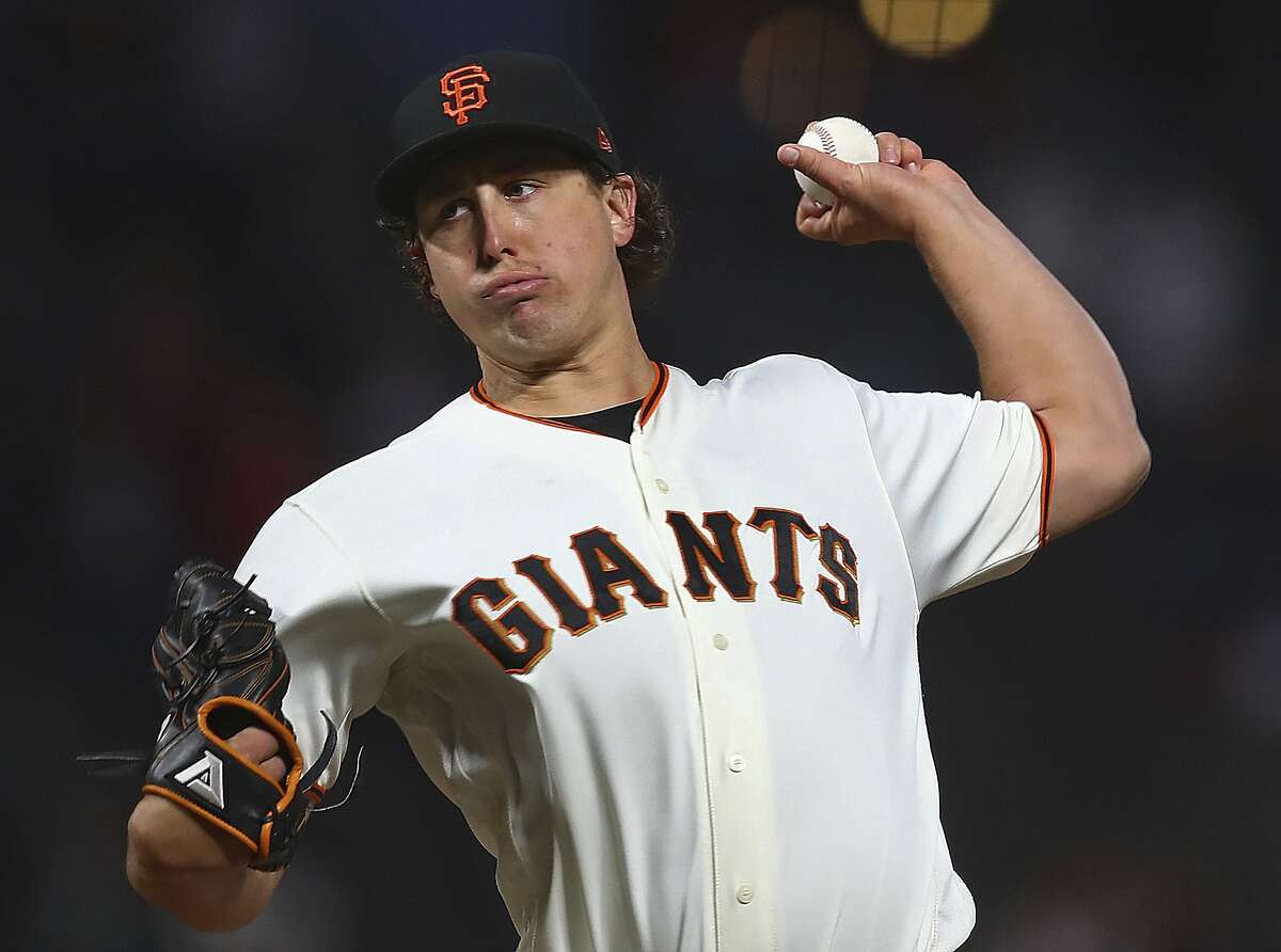 San Francisco Giants pitcher Derek Holland works against the San Diego Padres in the first inning of a baseball game Monday, Sept. 24, 2018, in San Francisco. (AP Photo/Ben Margot)