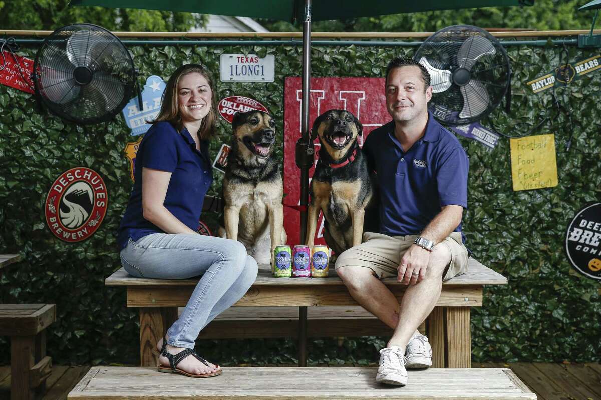 Henderson Heights owners Megan and Steve Long, along with their dogs, Chloe and Rocky, have launched Good Boy Dog Beer, a pork, chicken or vegetable based beverage for dogs Thursday Sept. 20, 2018 in Houston.